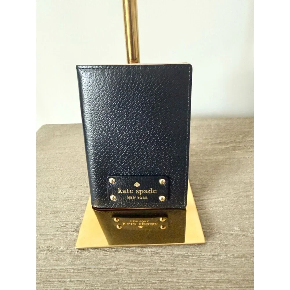 kate spade Black Pebbled Leather Passport Wallet with Gold Accent EUC